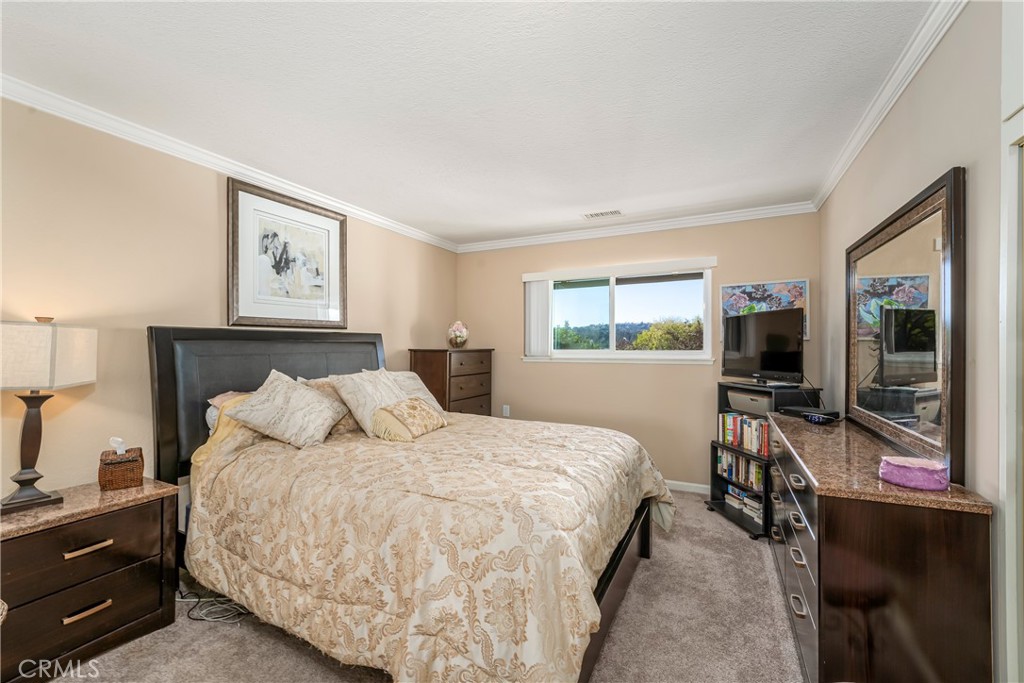 898 Ronda Sevilla, Unit N Laguna Woods, CA 92637 - Photo 29 of 71 Primary bedroom