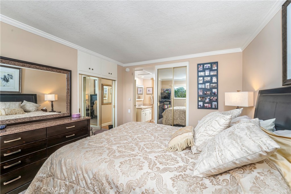 898 Ronda Sevilla, Unit N Laguna Woods, CA 92637 - Photo 30 of 71 Primary bedroom