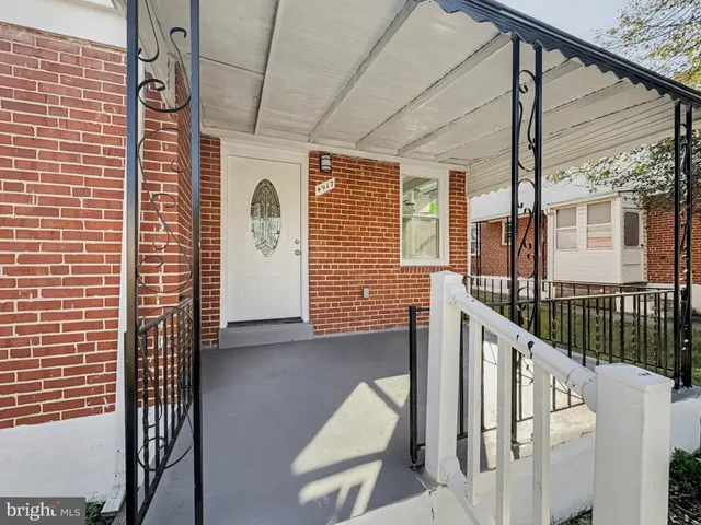 a view of a porch with wooden floor