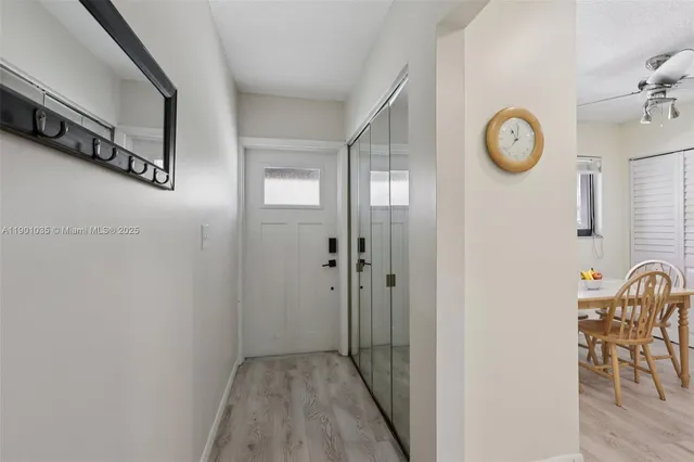 a view of a hallway with elevator