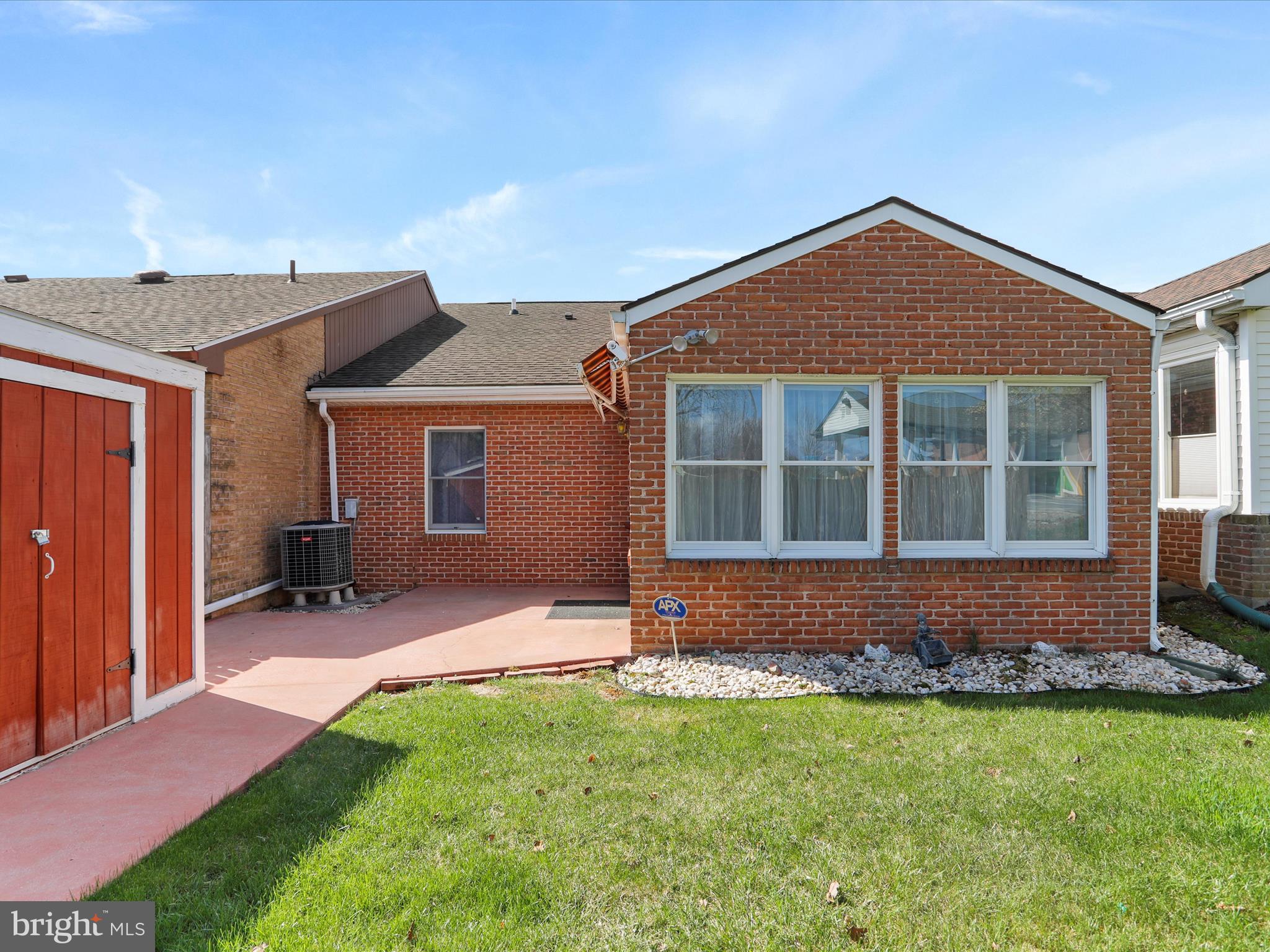 18016 Putter Drive Hagerstown, MD 21740 - Photo 24 of 26 a front view of a house with a yard