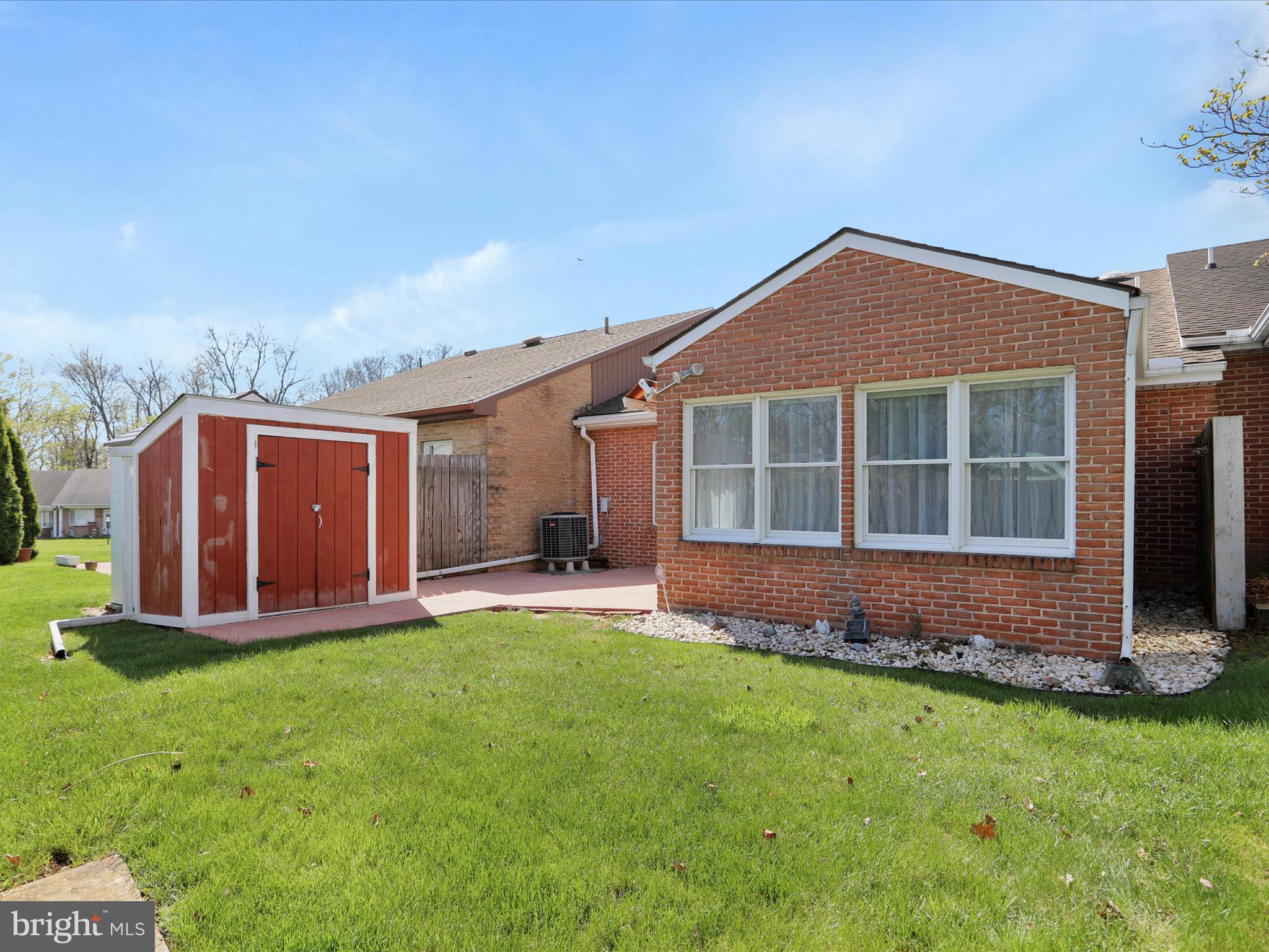 18016 Putter Drive Hagerstown, MD 21740 - Photo 25 of 26 a front view of a house with a yard and porch
