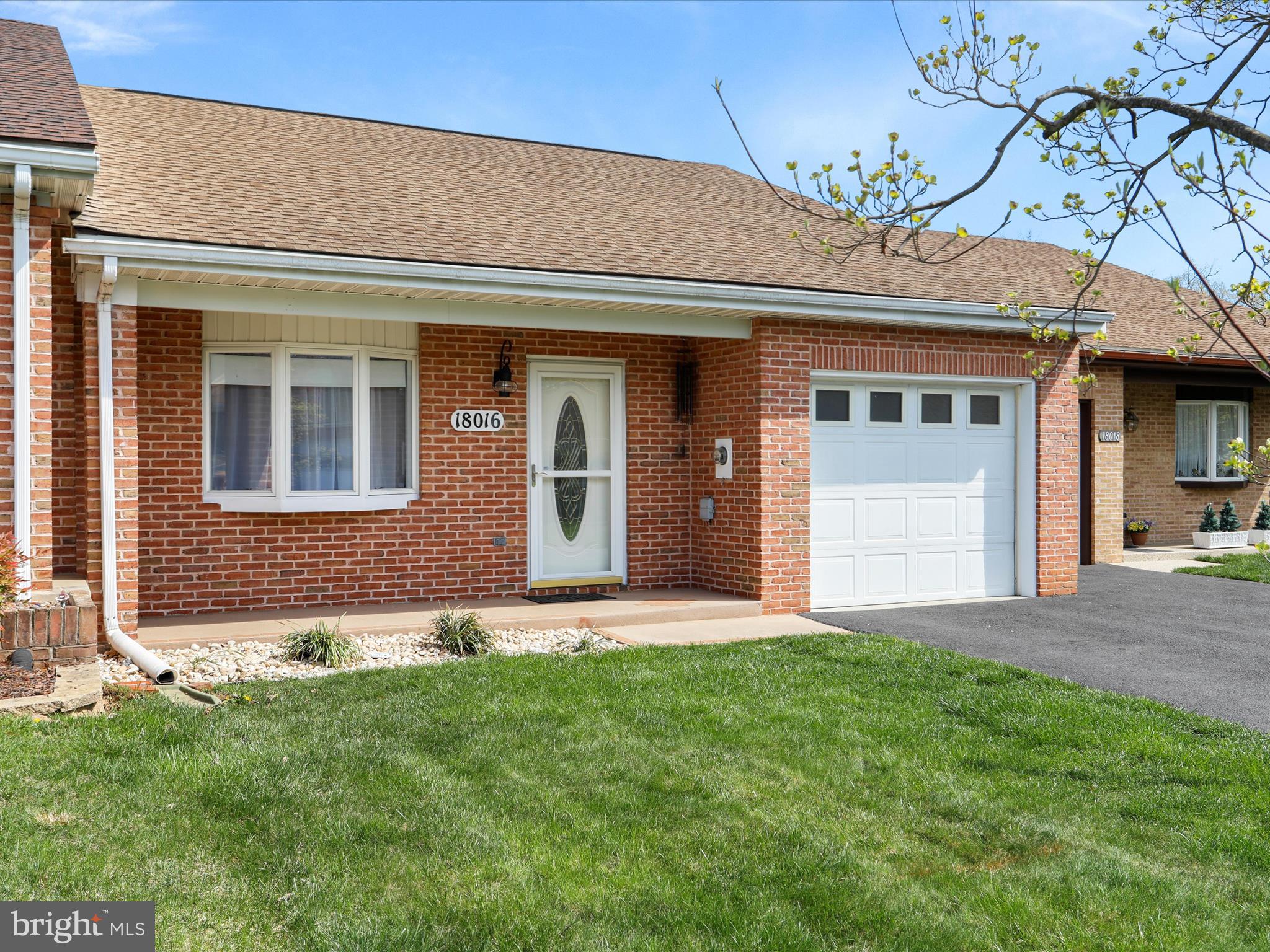 18016 Putter Drive Hagerstown, MD 21740 - Photo 4 of 26 front view of a house with a yard