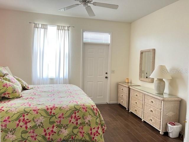 3181 Matecumbe Key Road, Unit 34 Punta Gorda, FL 33955 - Photo 16 of 54 a bedroom with a bed and a dresser