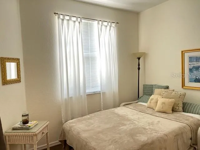 a view of workspace with wooden floor and chair