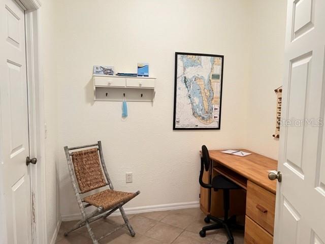 3181 Matecumbe Key Road, Unit 34 Punta Gorda, FL 33955 - Photo 22 of 54 a view of workspace with wooden floor and chair