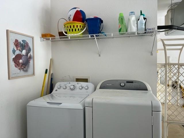 3181 Matecumbe Key Road, Unit 34 Punta Gorda, FL 33955 - Photo 23 of 54 a utility room with dryer and washer