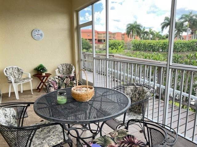 3181 Matecumbe Key Road, Unit 34 Punta Gorda, FL 33955 - Photo 5 of 54 a view of a dining room with furniture window and outside view