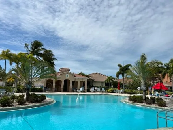 a front view of house with yard and outdoor seating