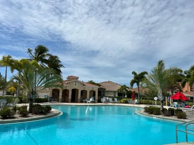 a front view of house with yard and outdoor seating