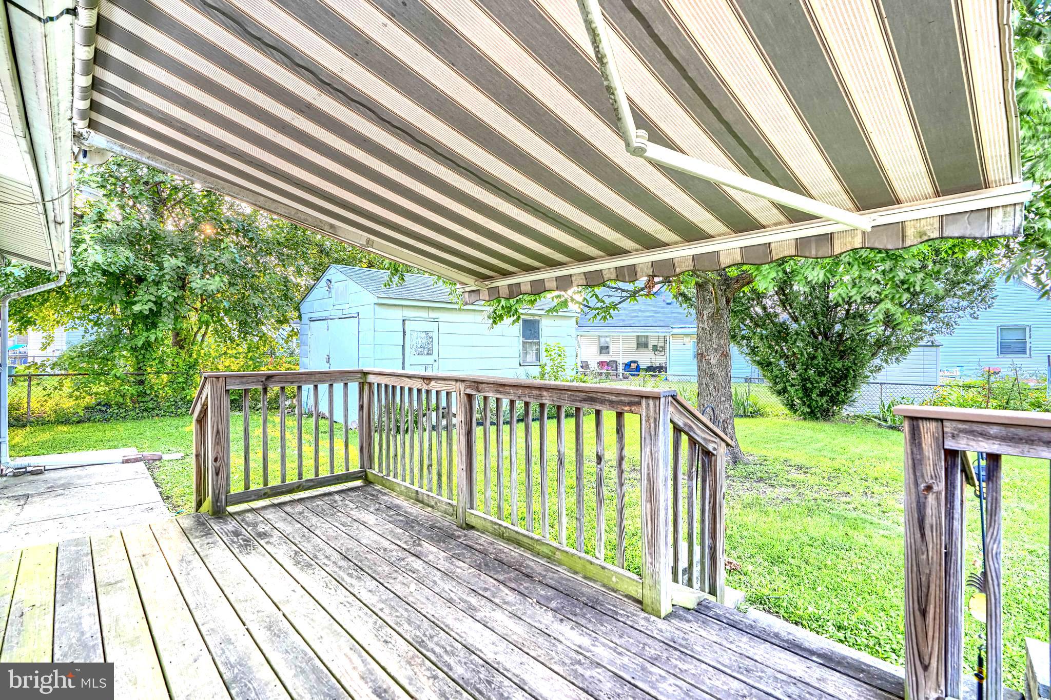 8206 Bullneck Road Baltimore, MD 21222 - Photo 28 of 33 Rear Deck w/SUNSETTER RETRACTABLE AWNING