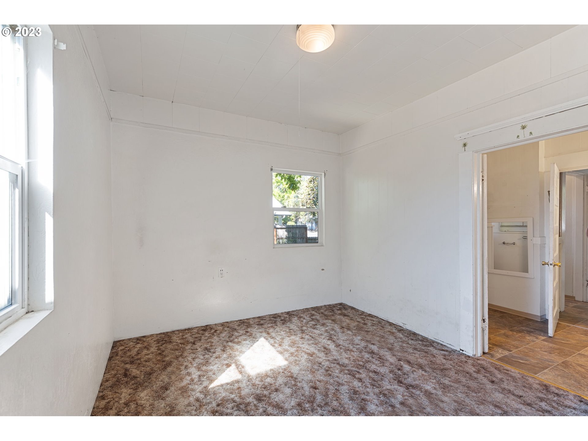 302 Southwest Pine Street Grants Pass, OR 97526 - Photo 13 of 20 a view of an empty room