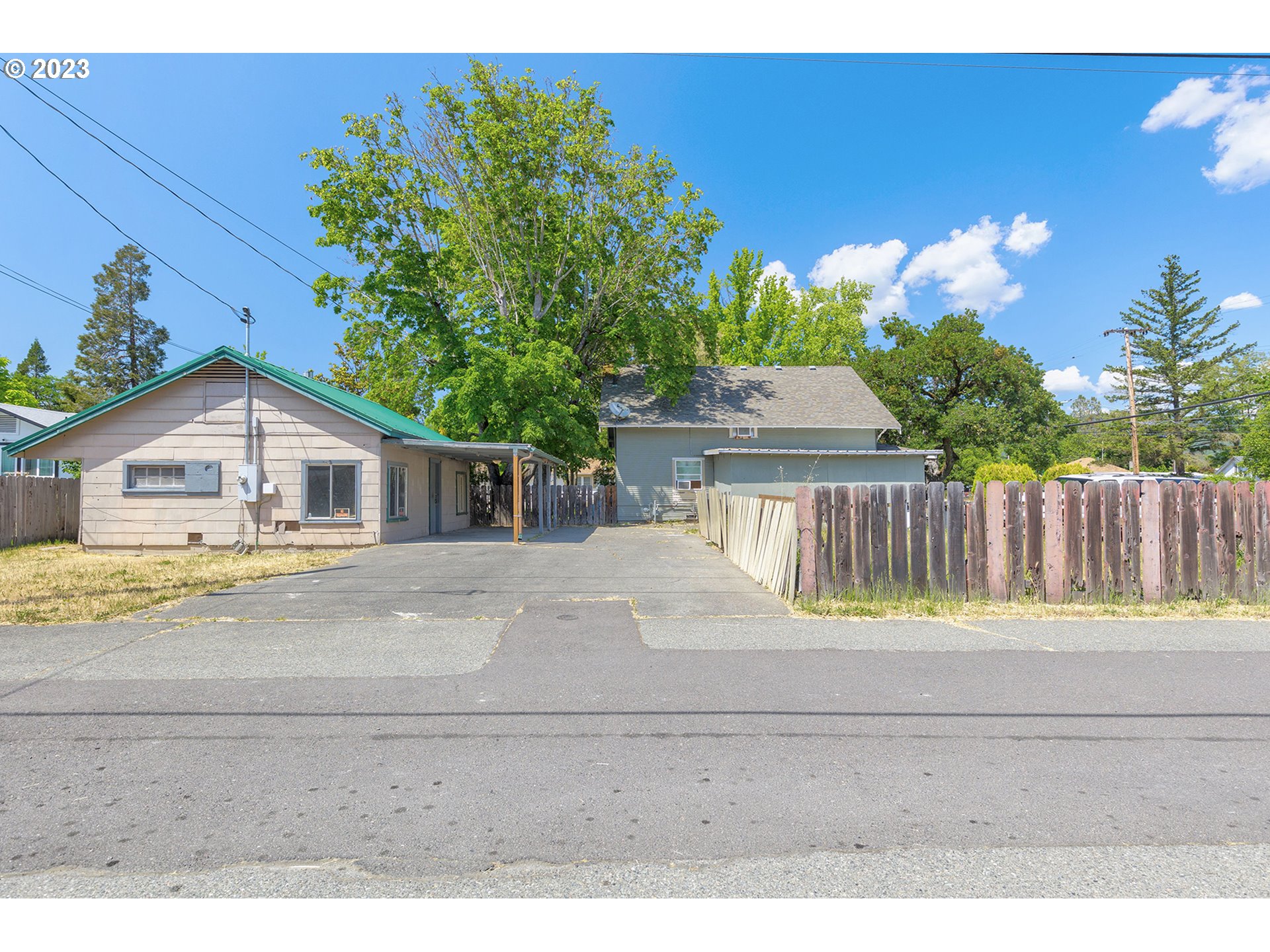 302 Southwest Pine Street Grants Pass, OR 97526 - Photo 8 of 20 a house view with a outdoor space