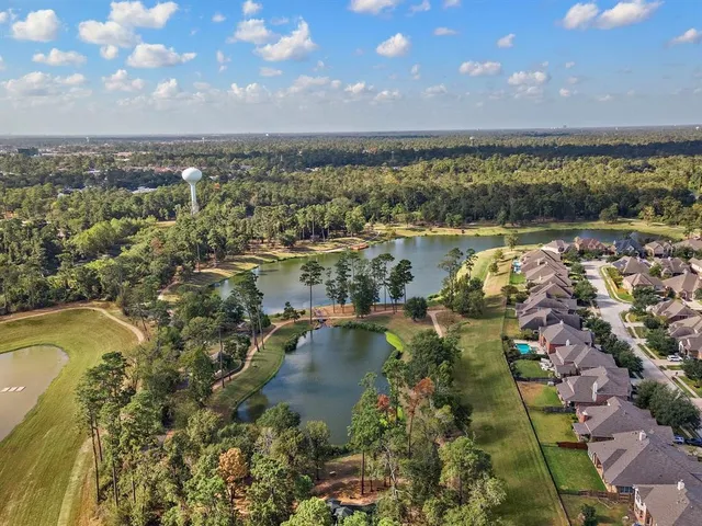 a view of a lake with a city
