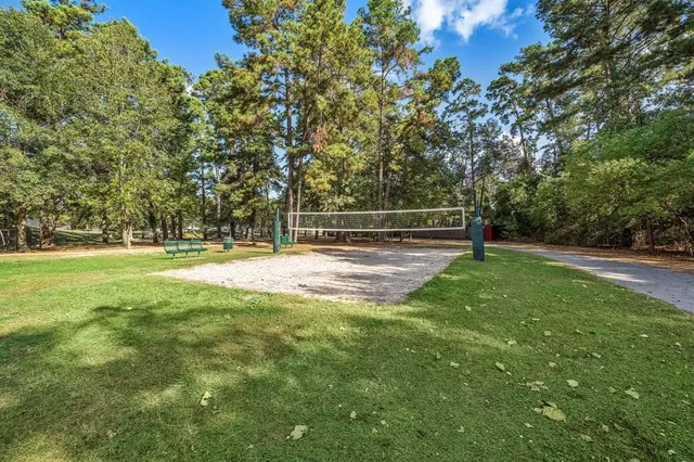 a view of outdoor space with deck and yard