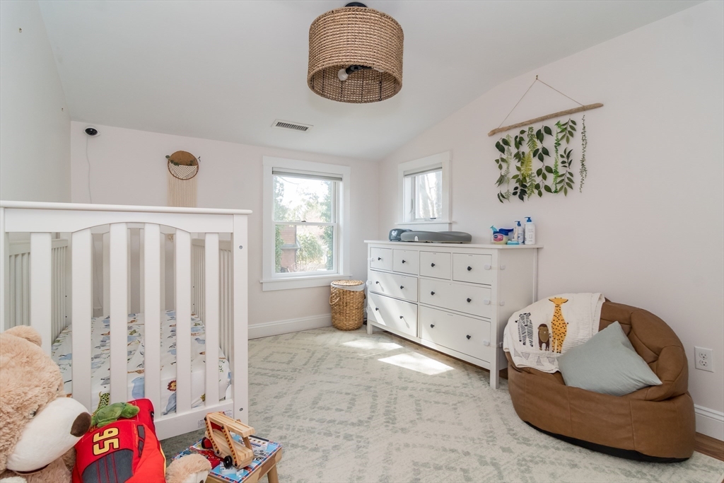 12 Durant Road Wellesley, MA 02482 - Photo 8 of 18 a bedroom with a bed and window