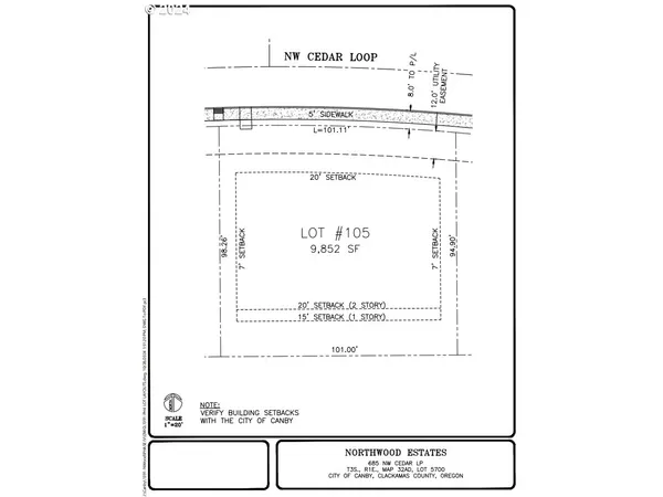a view of multiple houses with a yard