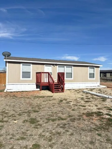 a view of a house with a patio