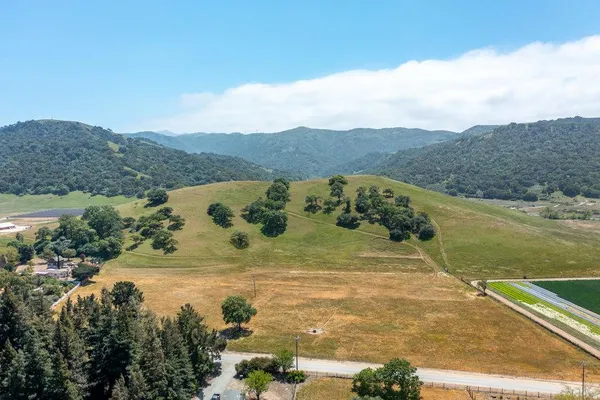 a view of a lake in middle of the town