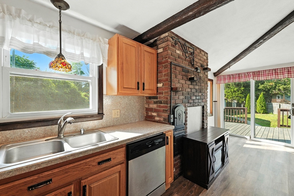 138 Suffield Street Agawam, MA 01001 - Photo 19 of 42 a kitchen with a sink cabinets and window