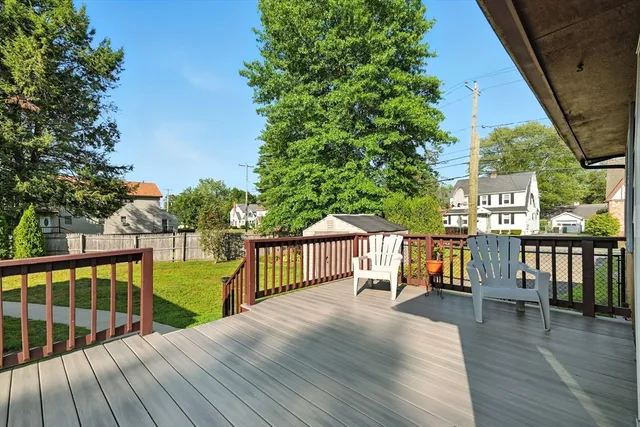a view of backyard with a garden and entertaining space