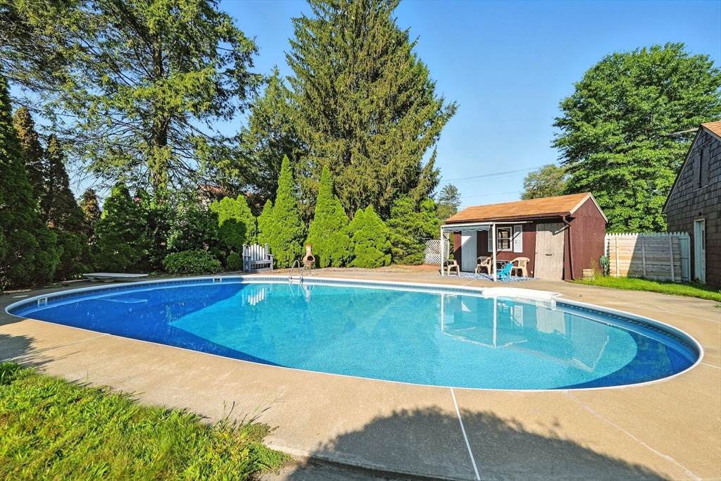 138 Suffield Street Agawam, MA 01001 - Photo 39 of 42 a view of a swimming pool with a patio