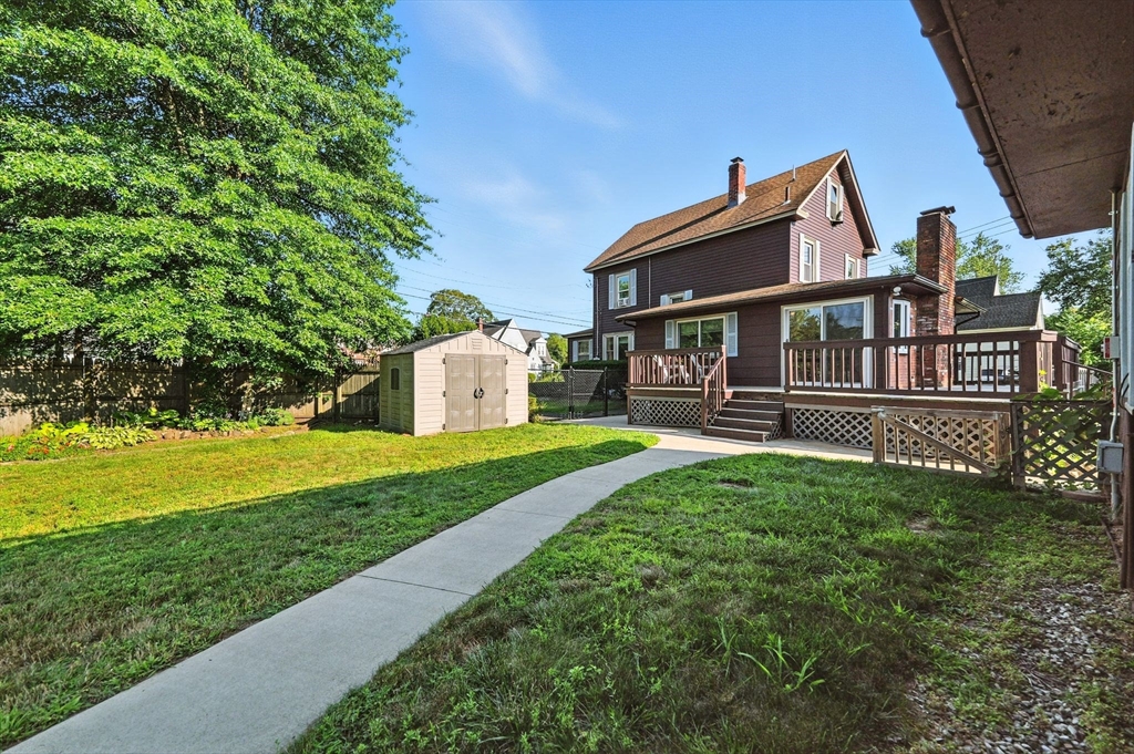 138 Suffield Street Agawam, MA 01001 - Photo 41 of 42 a front view of a house with a yard