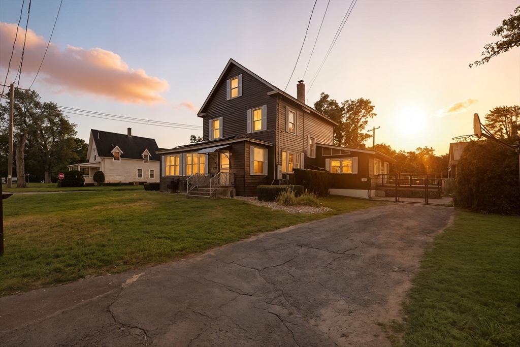 138 Suffield Street Agawam, MA 01001 - Photo 42 of 42 a front view of a house with a yard