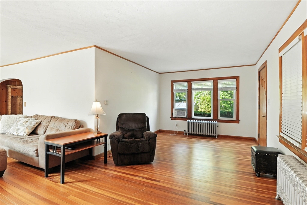 138 Suffield Street Agawam, MA 01001 - Photo 7 of 42 a living room with furniture and a window