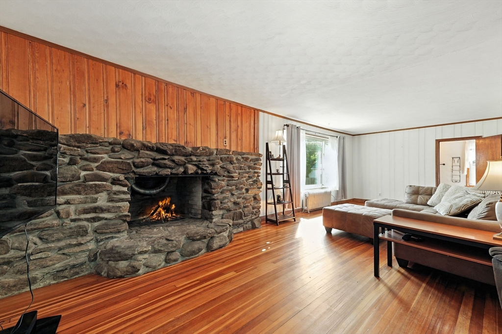 138 Suffield Street Agawam, MA 01001 - Photo 8 of 42 a living room with furniture and wooden floor