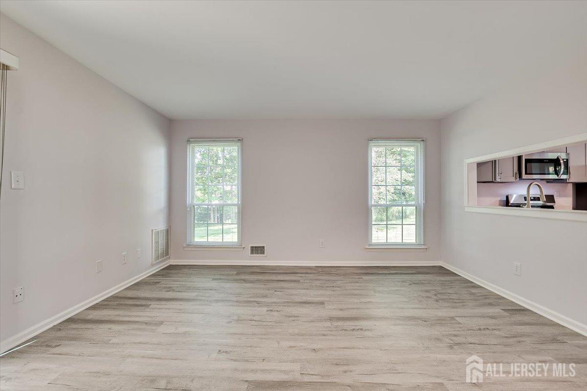 706 Maplecrest Road Edison, NJ 08820 - Photo 19 of 34 a view of an empty room with a window