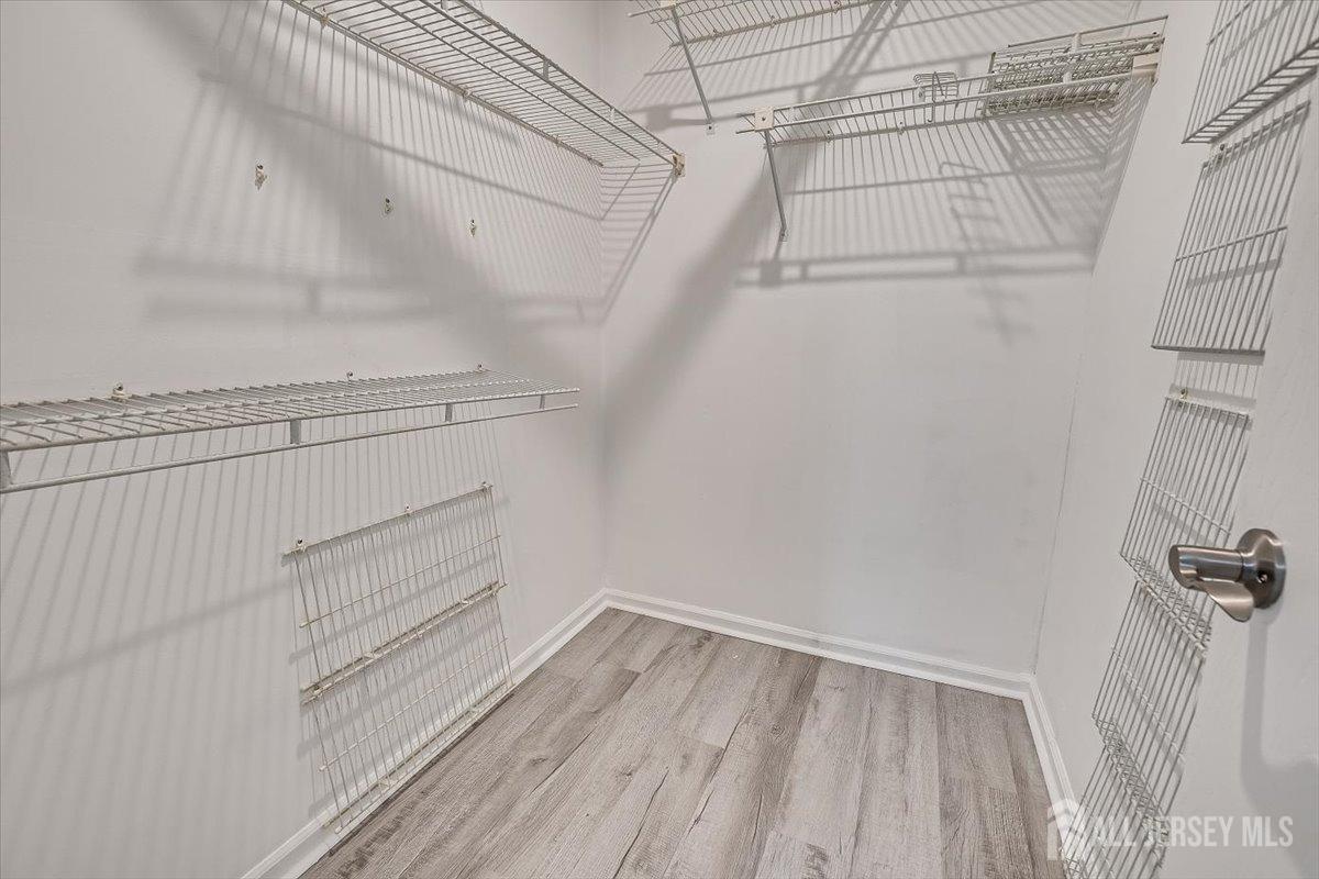 706 Maplecrest Road Edison, NJ 08820 - Photo 23 of 34 a view of a room with racks on the wall
