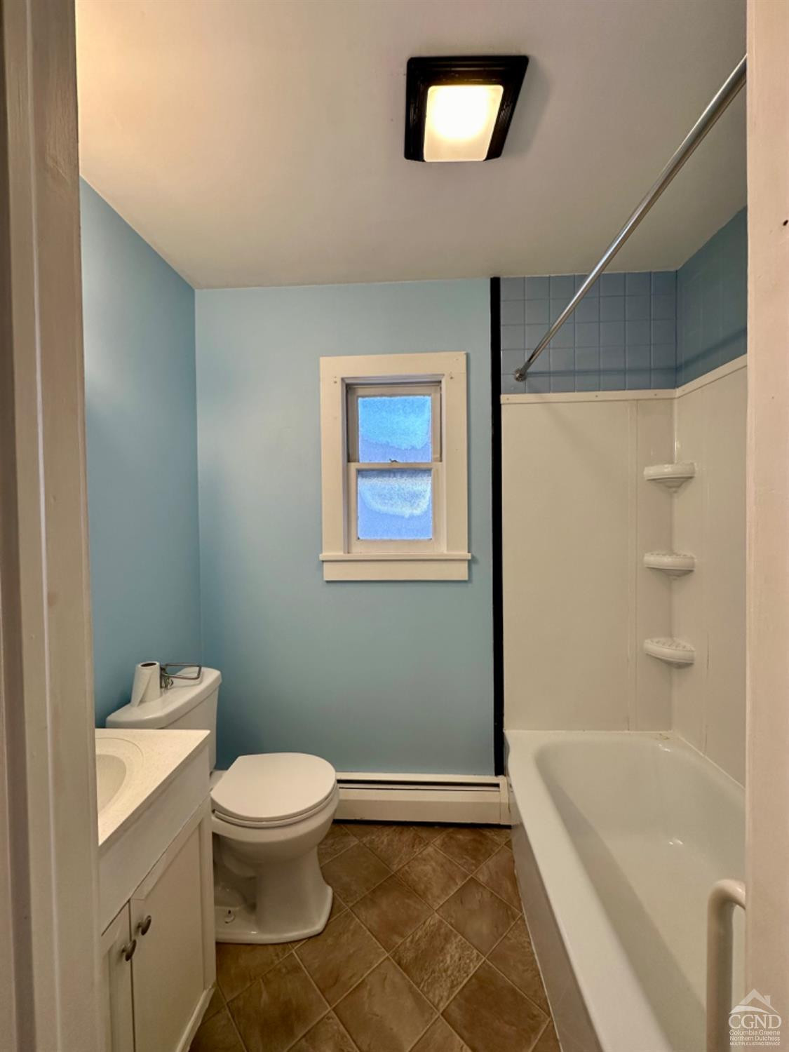 20 Eagle Street, Unit 2 Claverack, NY 12529 - Photo 14 of 20 a bathroom with a toilet a sink and bathtub