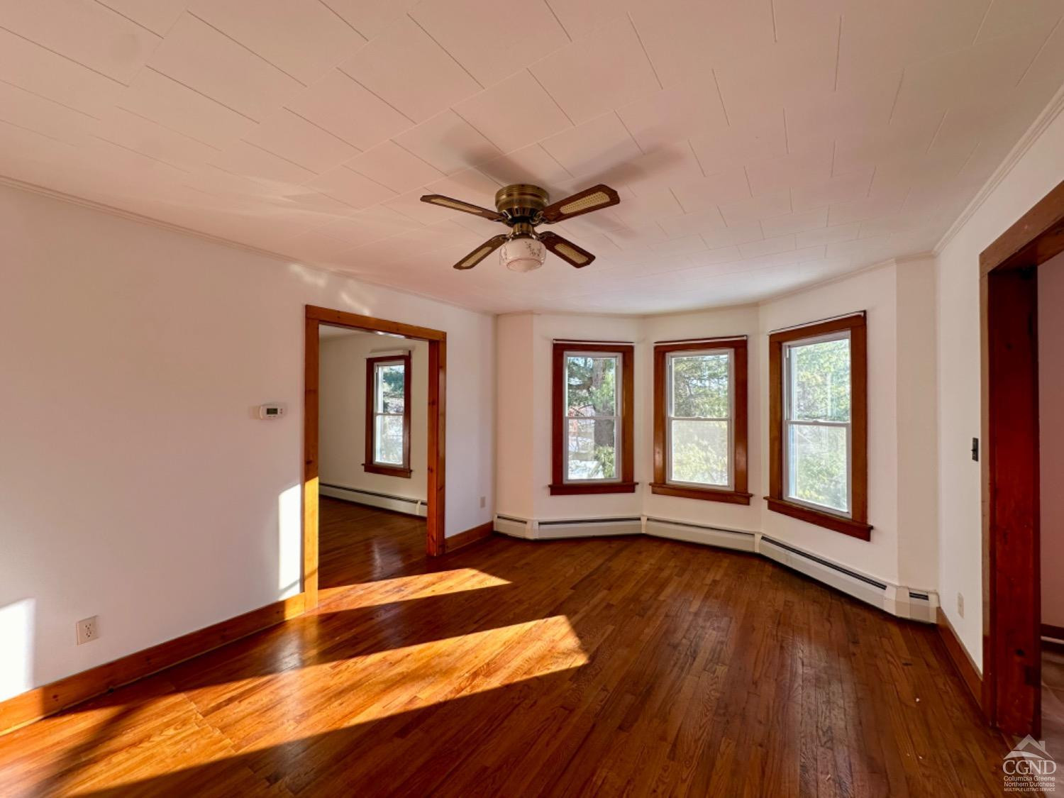 20 Eagle Street, Unit 2 Claverack, NY 12529 - Photo 2 of 20 a view of an empty room with a window and wooden floor