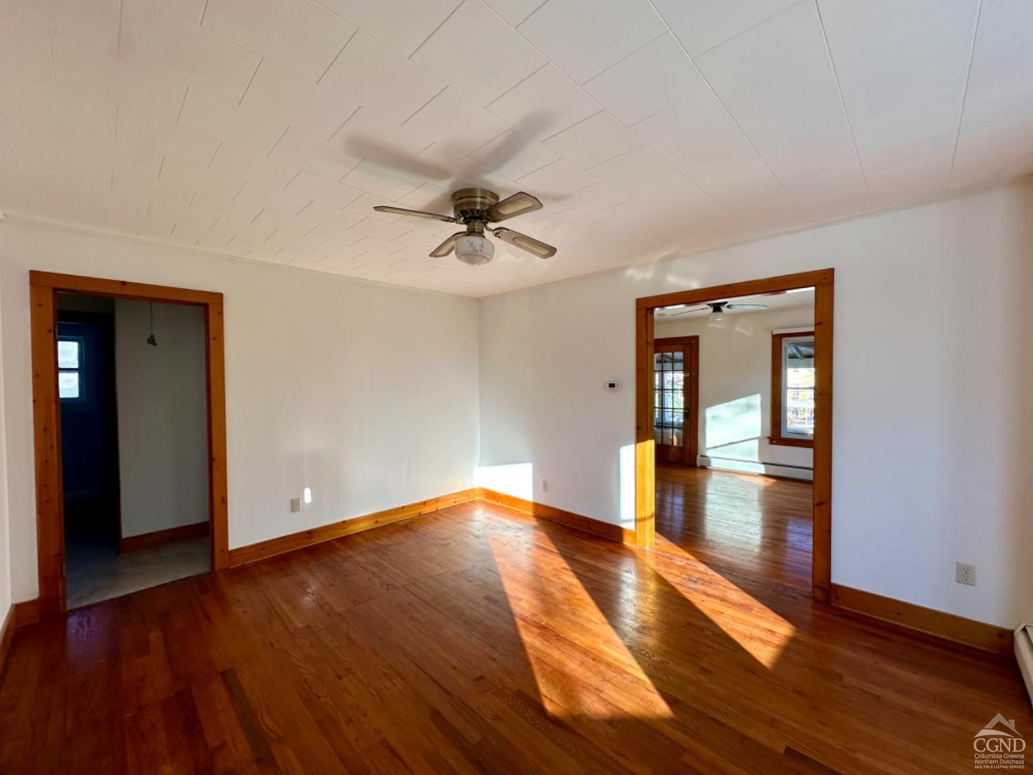 20 Eagle Street, Unit 2 Claverack, NY 12529 - Photo 6 of 20 a view of empty room with wooden floor and fan
