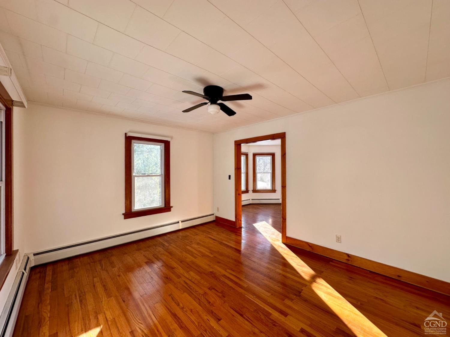 20 Eagle Street, Unit 2 Claverack, NY 12529 - Photo 9 of 20 a view of an empty room with a window and wooden floor
