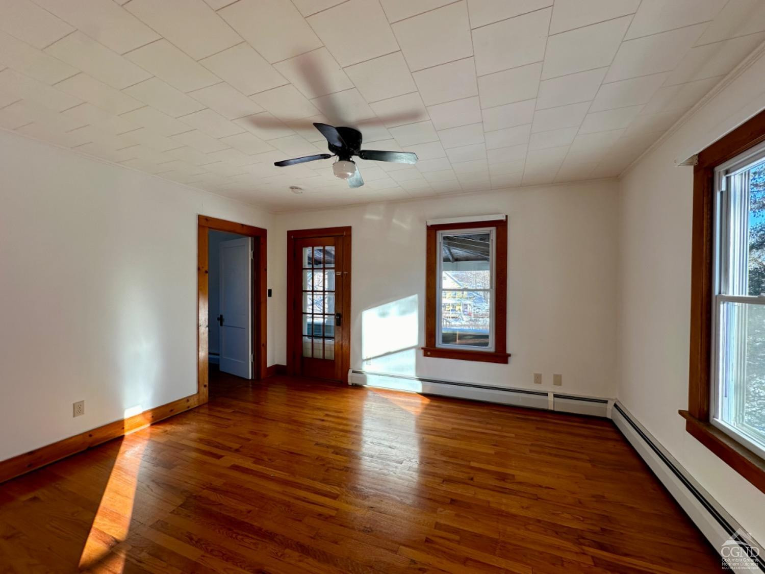 20 Eagle Street, Unit 2 Claverack, NY 12529 - Photo 10 of 20 a view of an empty room with a window and wooden floor