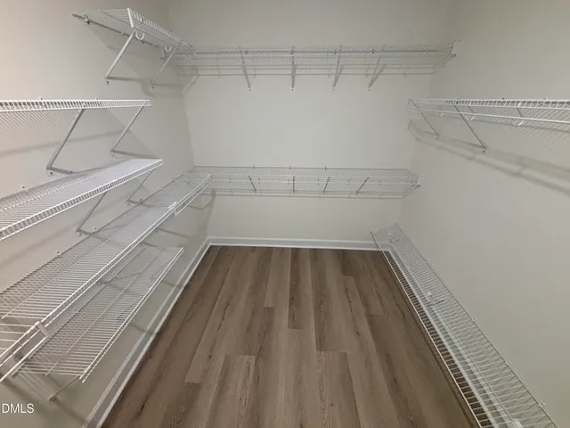 a view of a room with racks on the wall