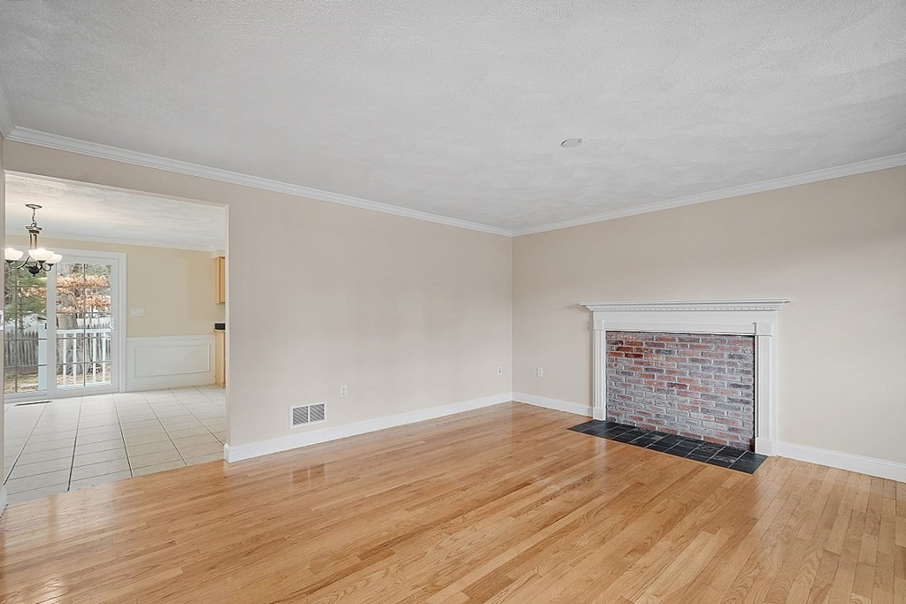34 Lowell Road, Unit 4 Pepperell, MA 01463 - Photo 10 of 21 wooden floor in an empty room