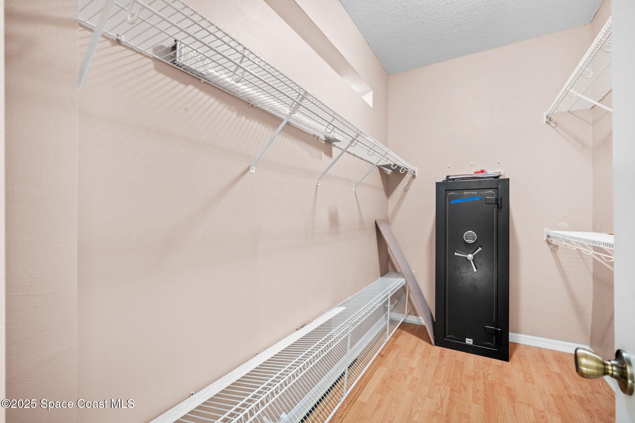 7635 Windover Way Titusville, FL 32780 - Photo 24 of 36 a view of a walk in closet