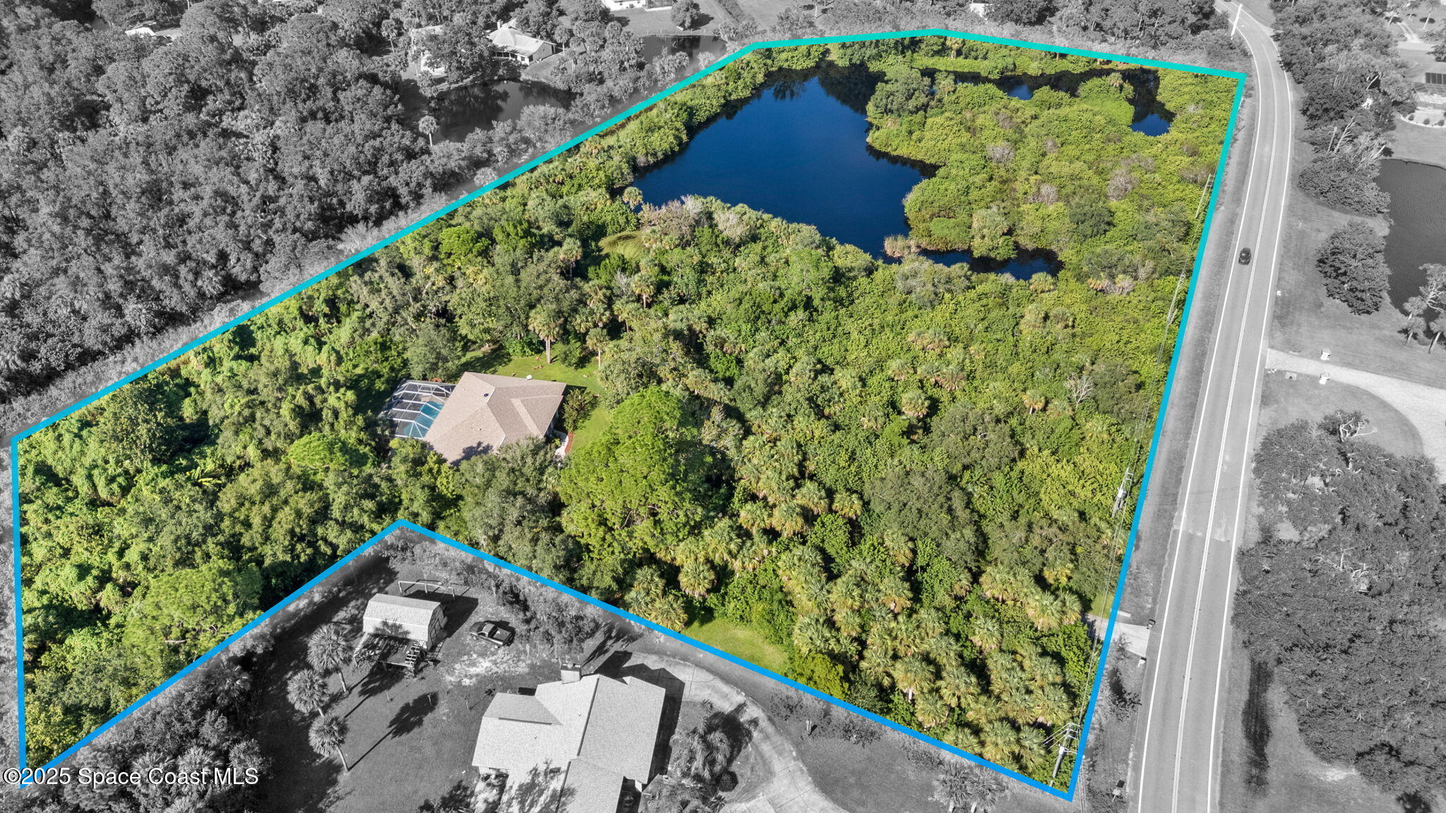 7635 Windover Way Titusville, FL 32780 - Photo 3 of 36 a view of a garden with plants