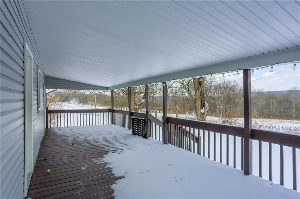 457 East Crestview Drive Transfer, PA 16154 - Photo 25 of 35 a view of a porch with wooden floor of the house