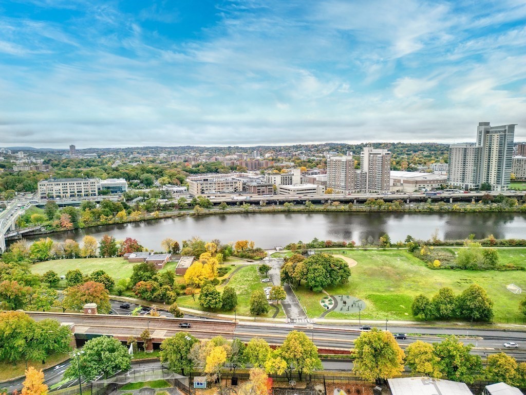 31-33 Rockingham Street Cambridge, MA 02139 - Photo 18 of 22 a view of a lake with a city