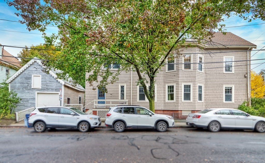 31-33 Rockingham Street Cambridge, MA 02139 - Photo 4 of 22 a view of street with parked cars