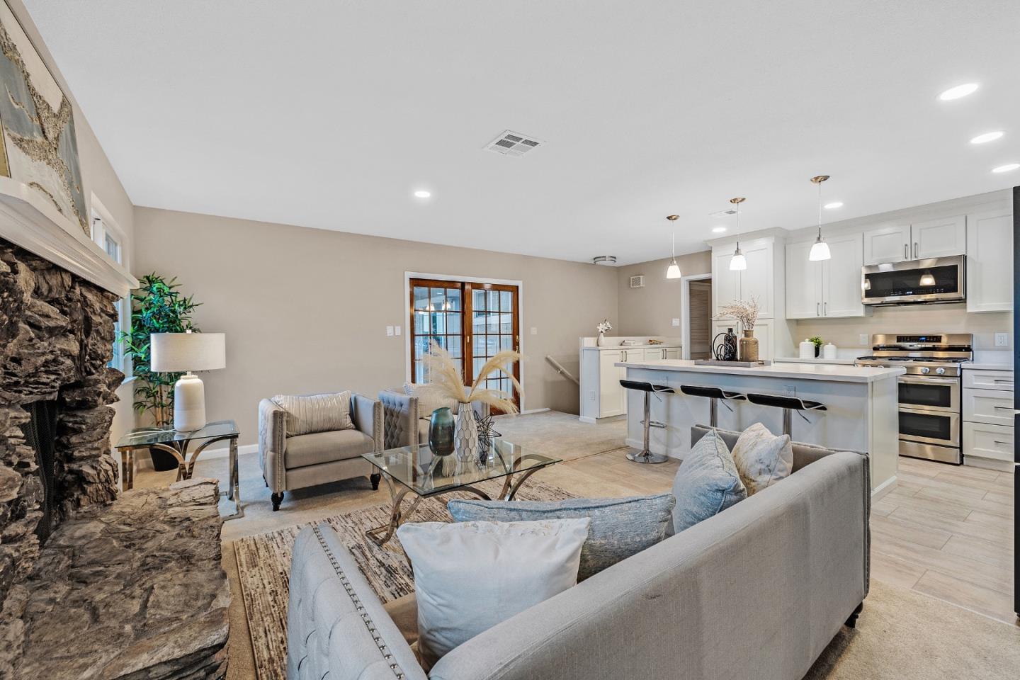 180 Mill Creek Road Fremont, CA 94539 - Photo 17 of 55 a living room with furniture and kitchen view