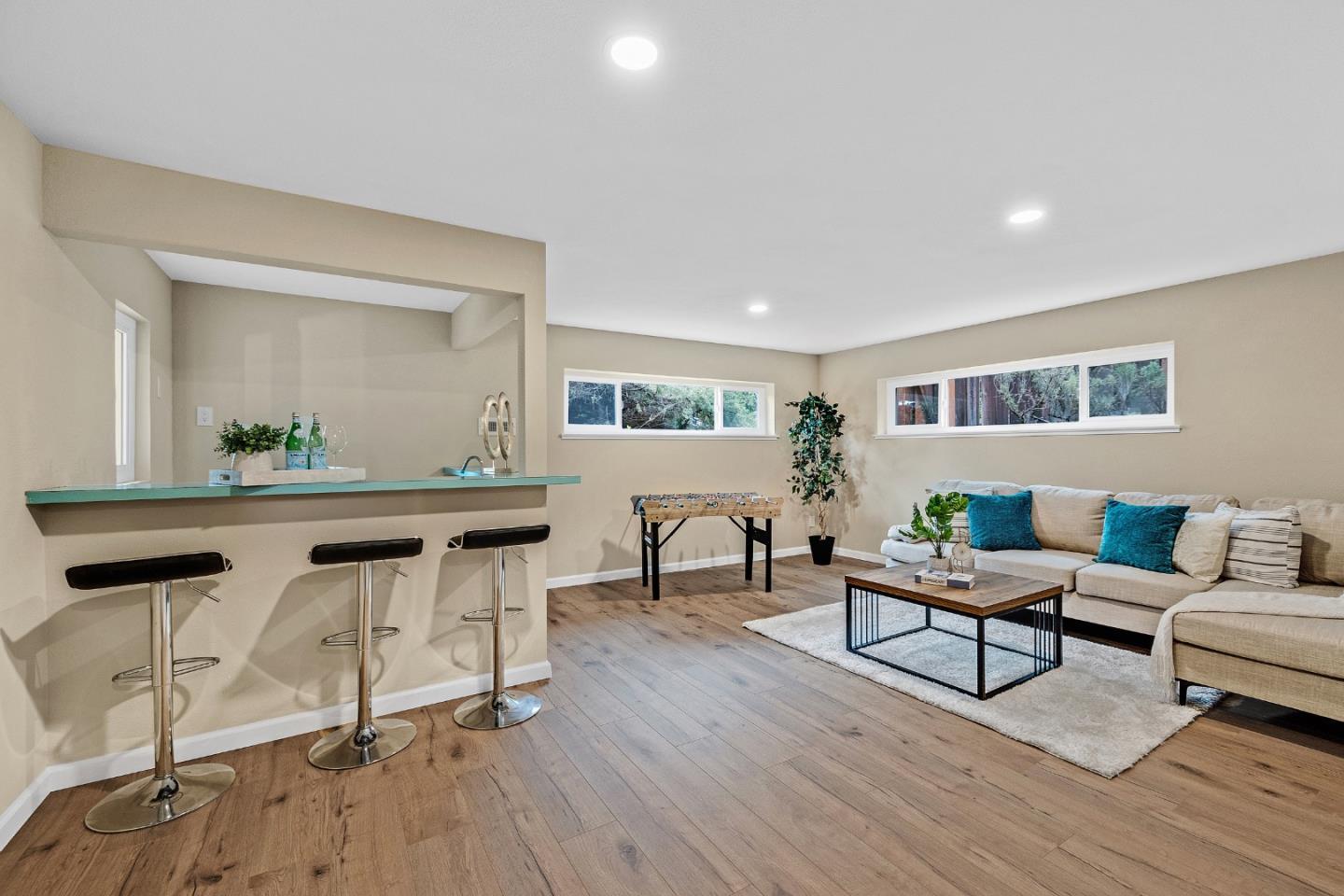 180 Mill Creek Road Fremont, CA 94539 - Photo 33 of 55 a living room with furniture and a wooden floor