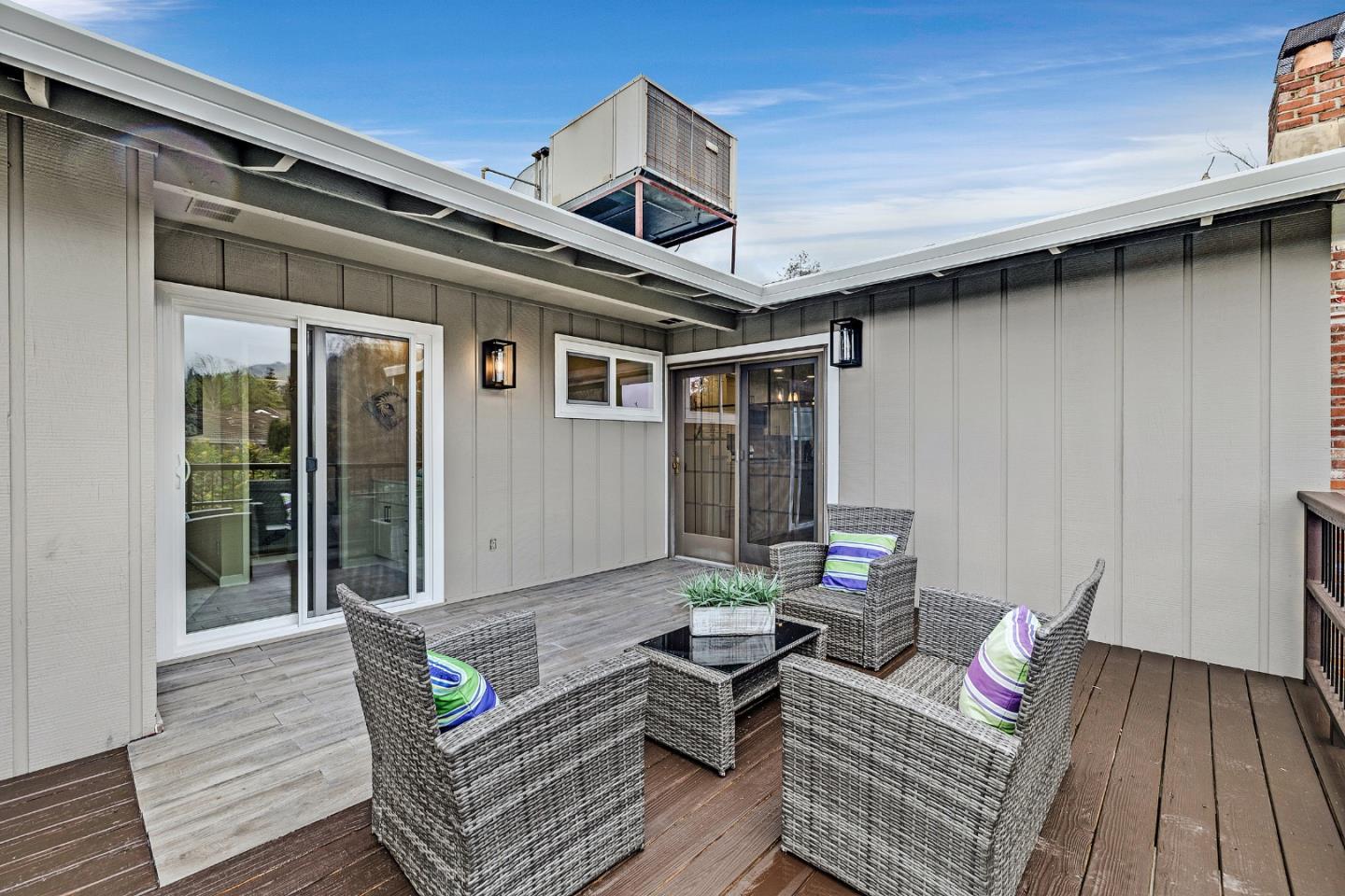 180 Mill Creek Road Fremont, CA 94539 - Photo 40 of 55 a outdoor living space with furniture and wooden floor