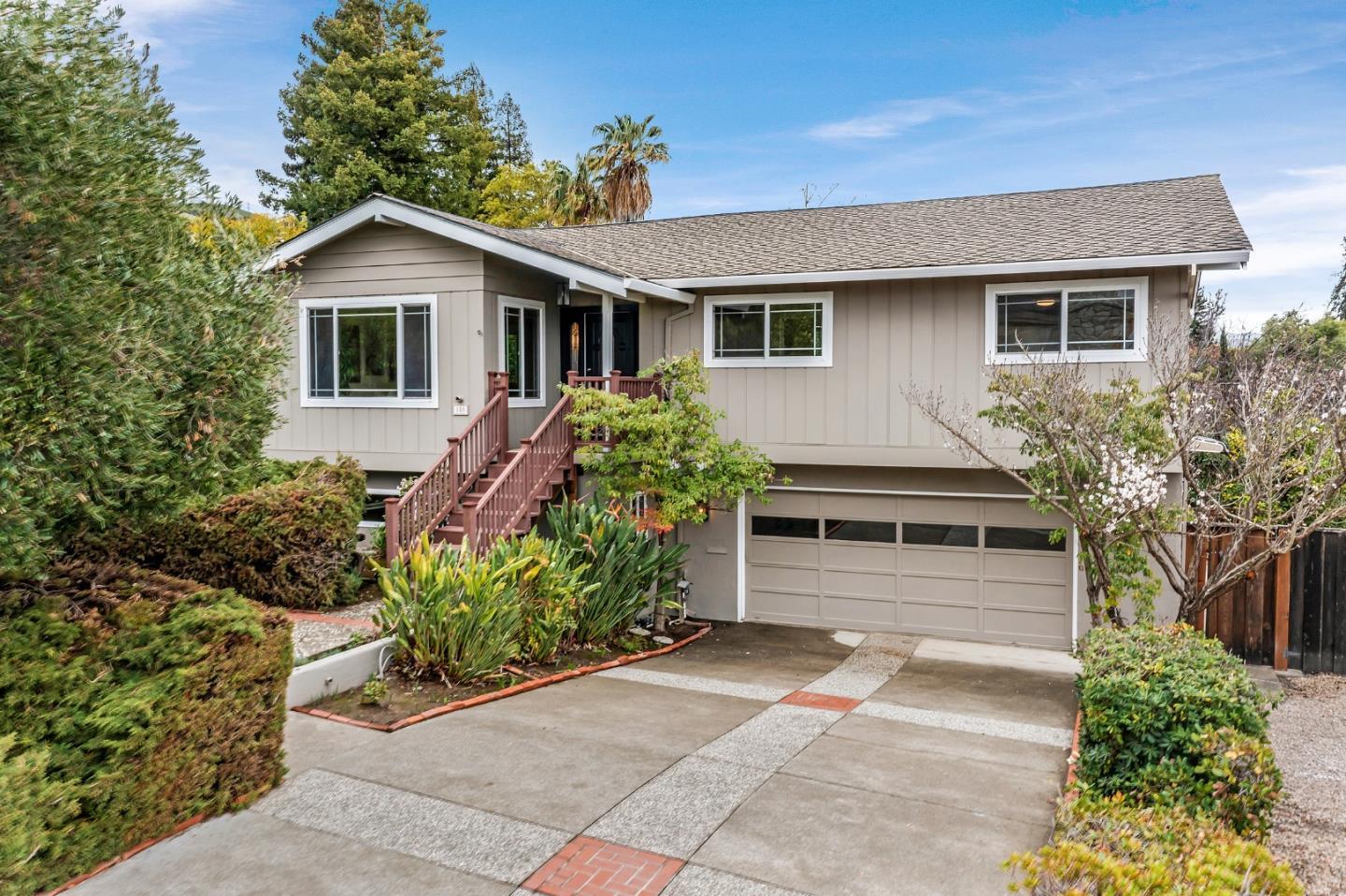 180 Mill Creek Road Fremont, CA 94539 - Photo 42 of 55 a front view of a house with garden