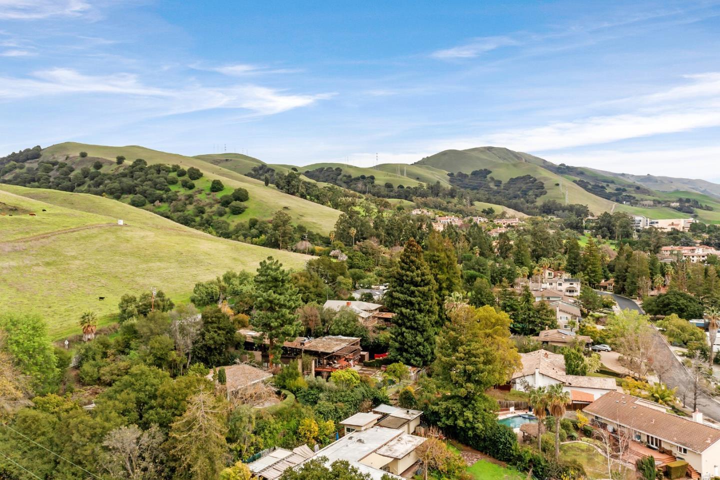 180 Mill Creek Road Fremont, CA 94539 - Photo 49 of 55 a view of a city with mountains in the background