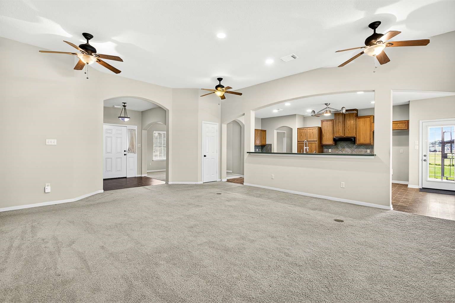 329 Gou Hole Road Cove, TX 77523 - Photo 11 of 19 an empty room with fan and windows